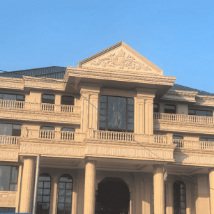 西安黄金麻别墅外墙干挂石材效果示例