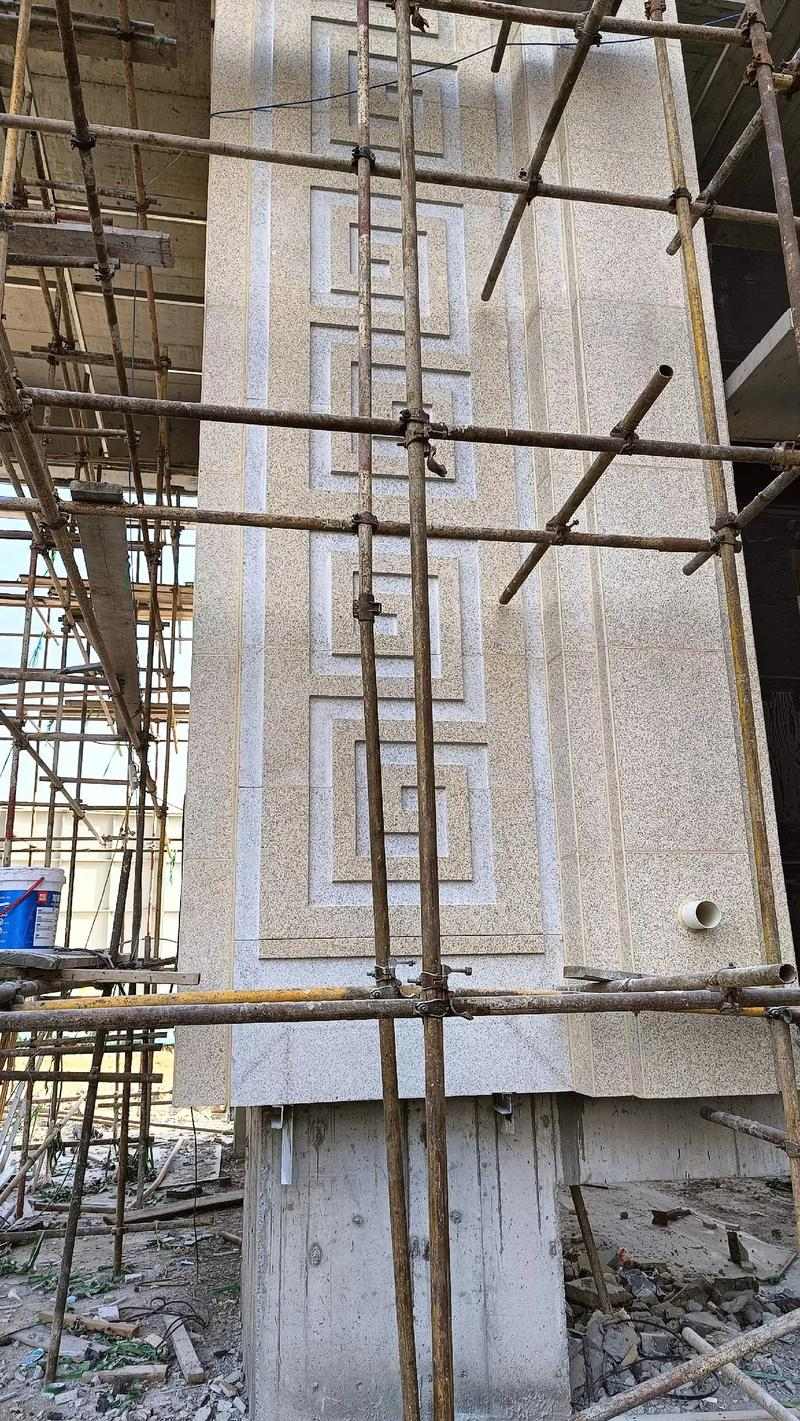 西安 黄金麻花岗岩别墅外墙干挂回纹造型效果