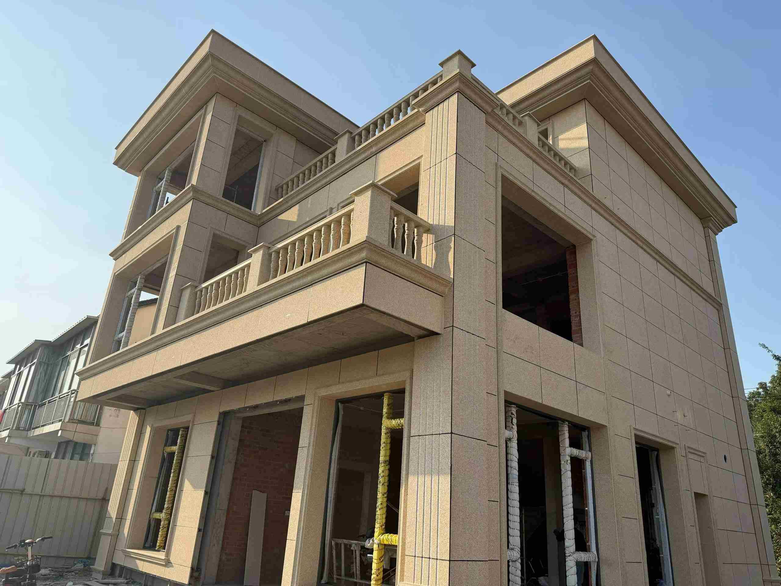 西安 黄金麻花岗岩石材荔枝面外墙干挂效果展示