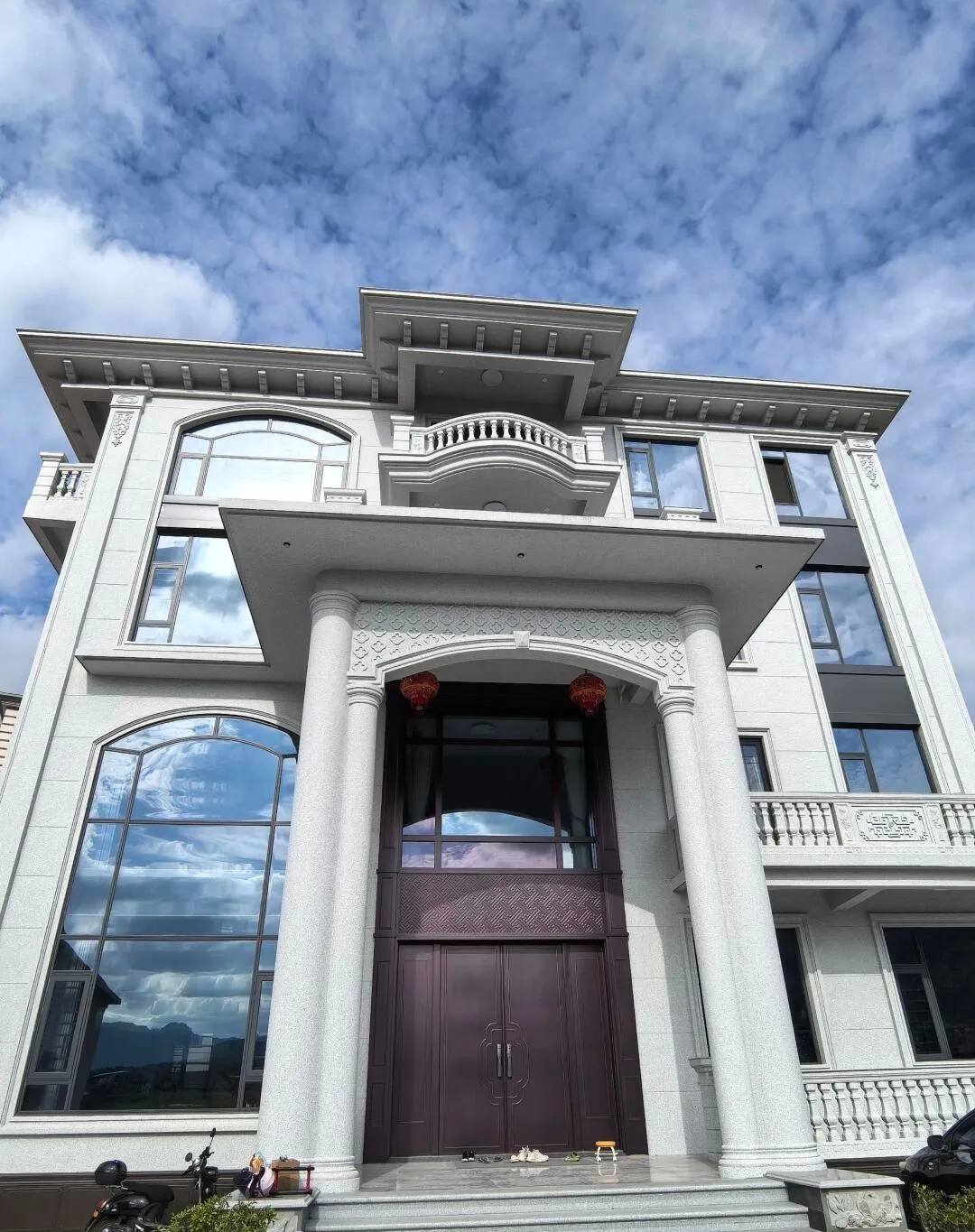 西安白麻别墅外墙干挂石材效果示例